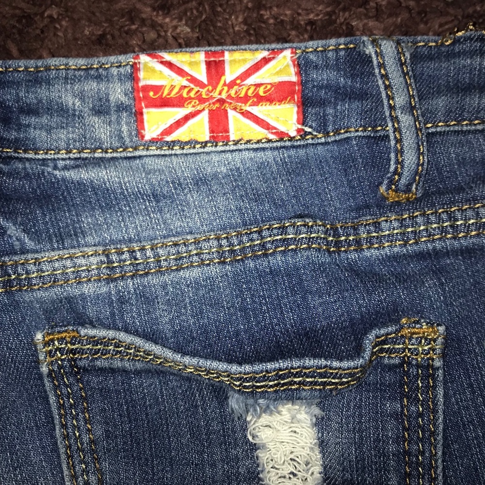 Distressed Machine Jeans